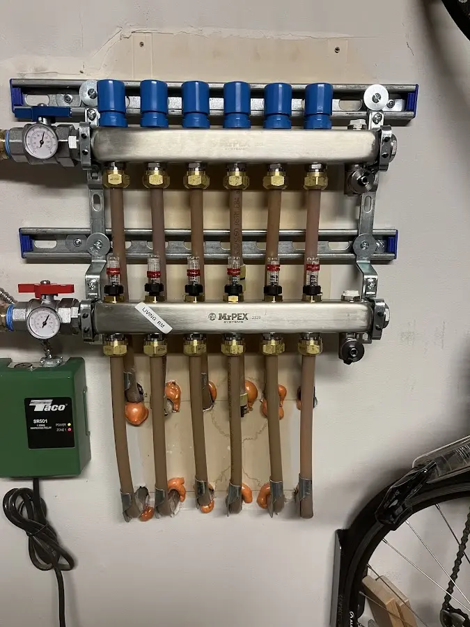 Plumber performing Water Heater Repair at a residential property in Earl